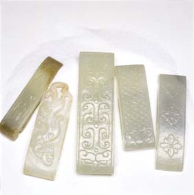 Appraisal: FIVE ANTIQUE JADE BELT FITTINGS Five Chinese carved jade belt