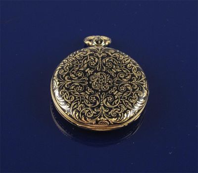 Appraisal: A ct gold open faced fob watch with foliate engraved