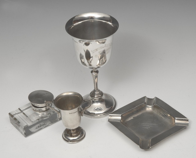 Appraisal: A SILVER TROPHY CUP with a flared bowl and tapering