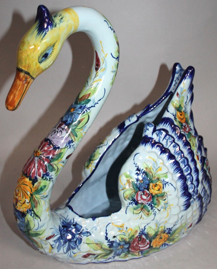 Appraisal: A modern Portuguese tin glazed model of a swan painted