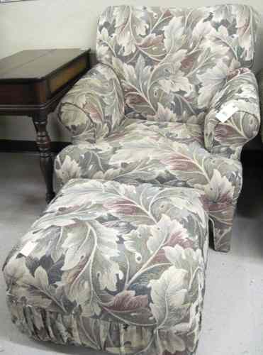 Appraisal: CONTEMPORARY UPHOLSTERED EASY CHAIR AND OTTOMAN with matching leaf tapestry