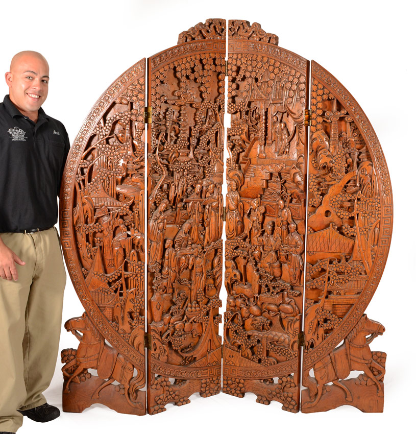 Appraisal: DEEPLY CARVED ORIENTAL PANEL SCREEN Intricate carved panels with double