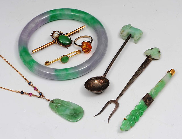 Appraisal: A collection of jade jewellery and an amber ringto include