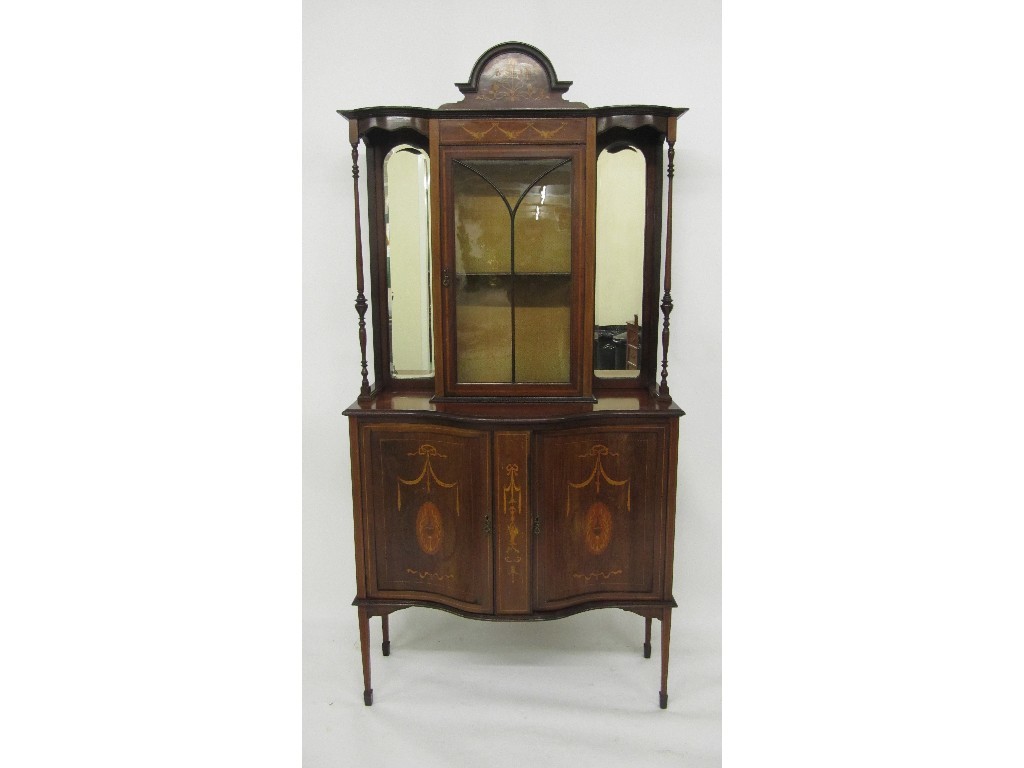 Appraisal: An Art Nouveau mahogany inlaid display cabinet the top bearing