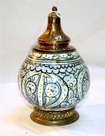 Appraisal: AN ANTIQUE PERSIAN BLUE AND WHITE POTTERY JAR with stylised