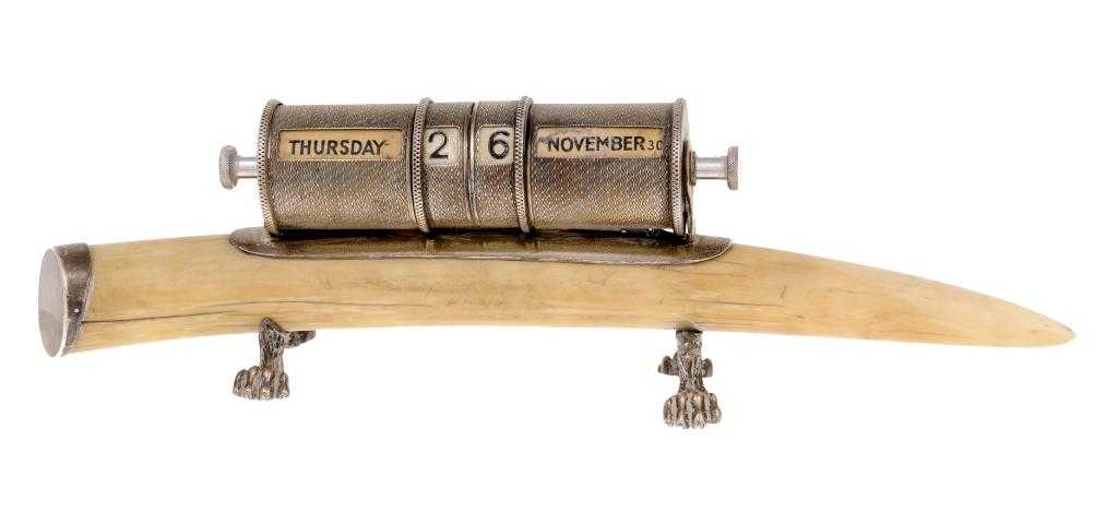 Appraisal: A GEORGE V SILVER-MOUNTED IVORY PERPETUAL CALENDAR the four rollers