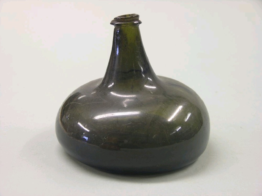 Appraisal: An early th century 'onion' wine bottle deep bottle green