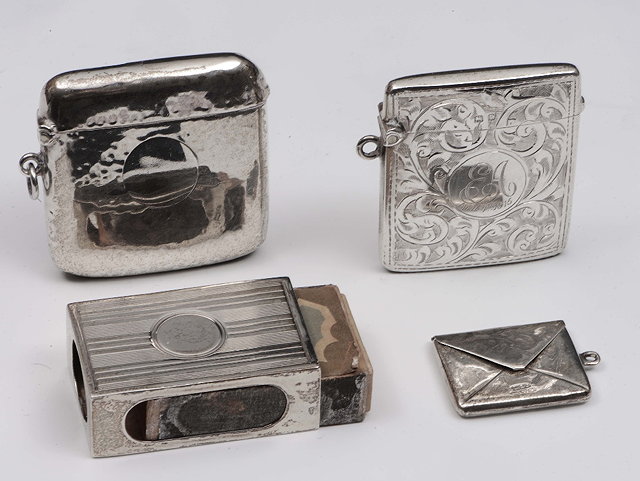 Appraisal: A silver stamp casein the form of an envelope together