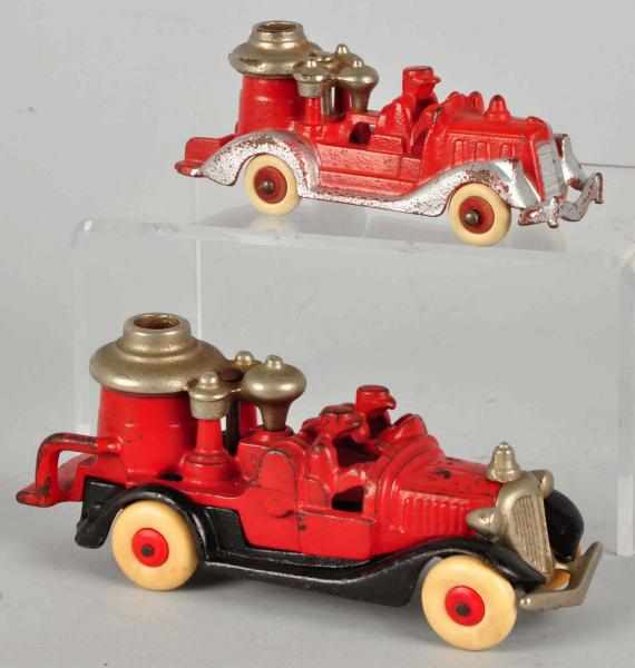 Appraisal: Lot of Cast Iron Hubley Fire Pumper Toys Description American