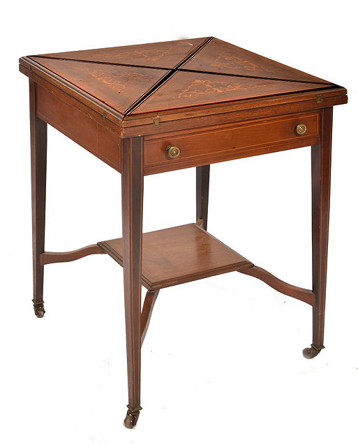 Appraisal: AN EDWARDIAN MAHOGANY INLAID ENVELOPE CARD TABLE the top inlaid