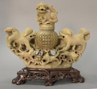 Appraisal: Large Chinese carved soapstone foodog sensor having foodog finial over