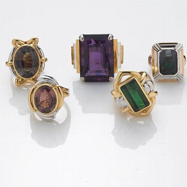 Appraisal: A collection of gem-set bicolor k and k gold rings