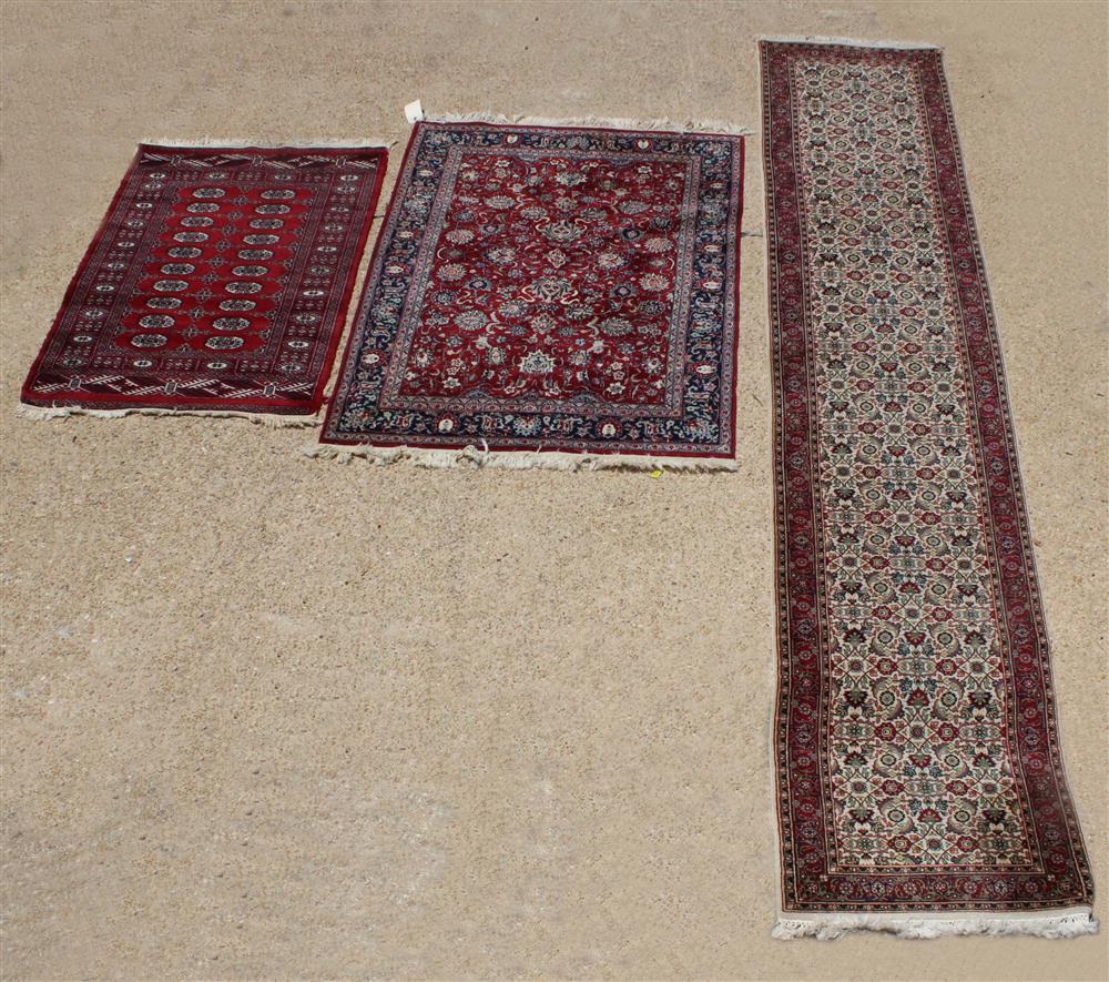 Appraisal: THREE ORIENTAL WOOL RUGS INCLUDING A TURKOMAN AND A RUNNER