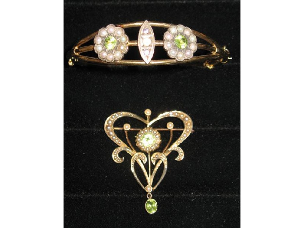 Appraisal: A CT GOLD EDWARDIAN OPENWORK BROOCH in the form of