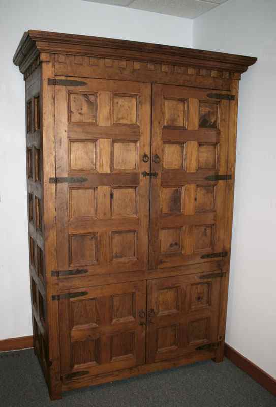 Appraisal: LARGE DOOR MEXICAN STORAGE CUPBOARD Crown and dental molding over