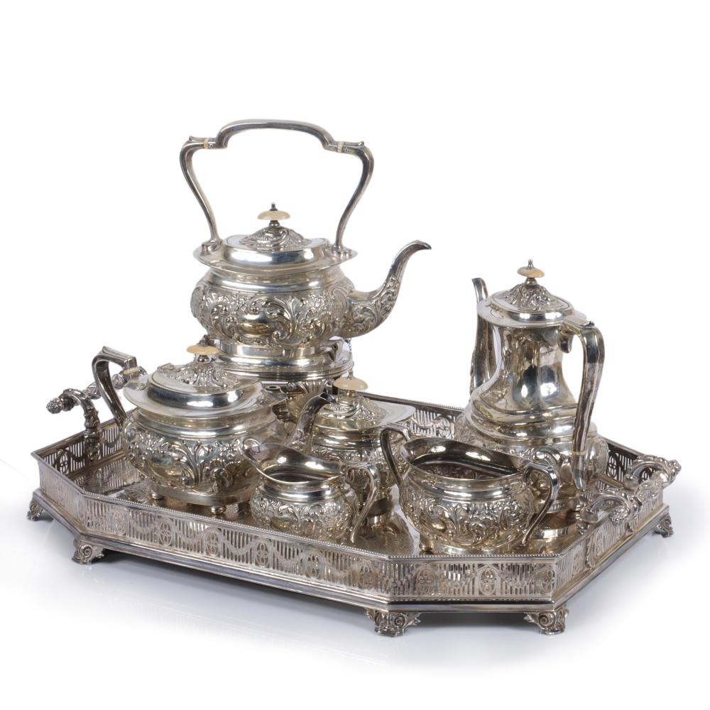 Appraisal: ANTIQUE ENGLISH SILVER PLATED TEA SERVICE ON FOOTED GALLERY TRAY