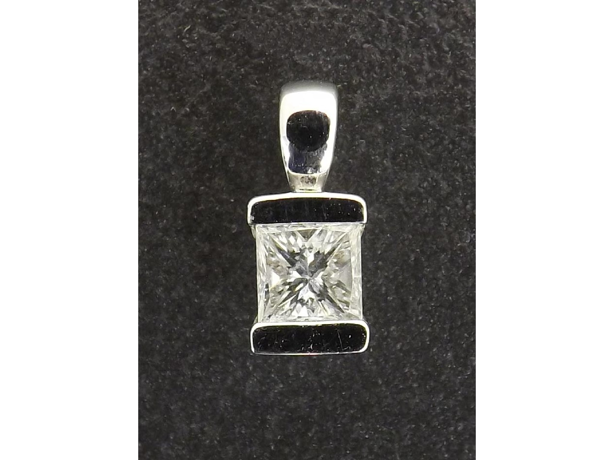 Appraisal: - -A Platinum princess-cut diamond set pendant ct approx mm