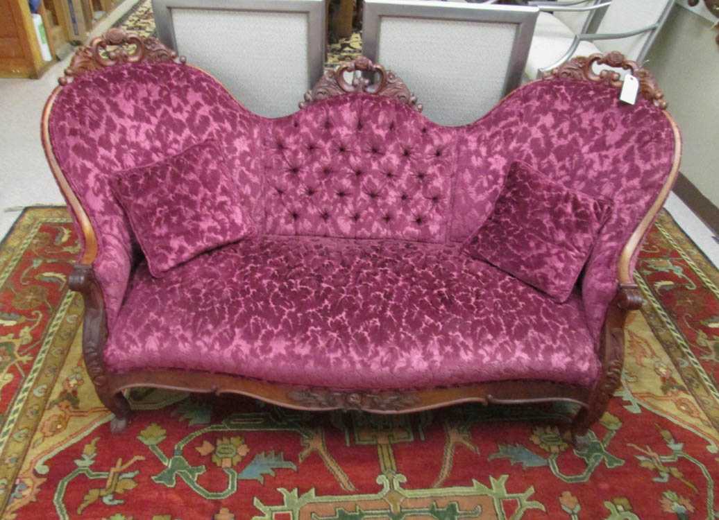 Appraisal: A VICTORIAN SERPENTINE-BACK SOFA Louis XV substyle American c having