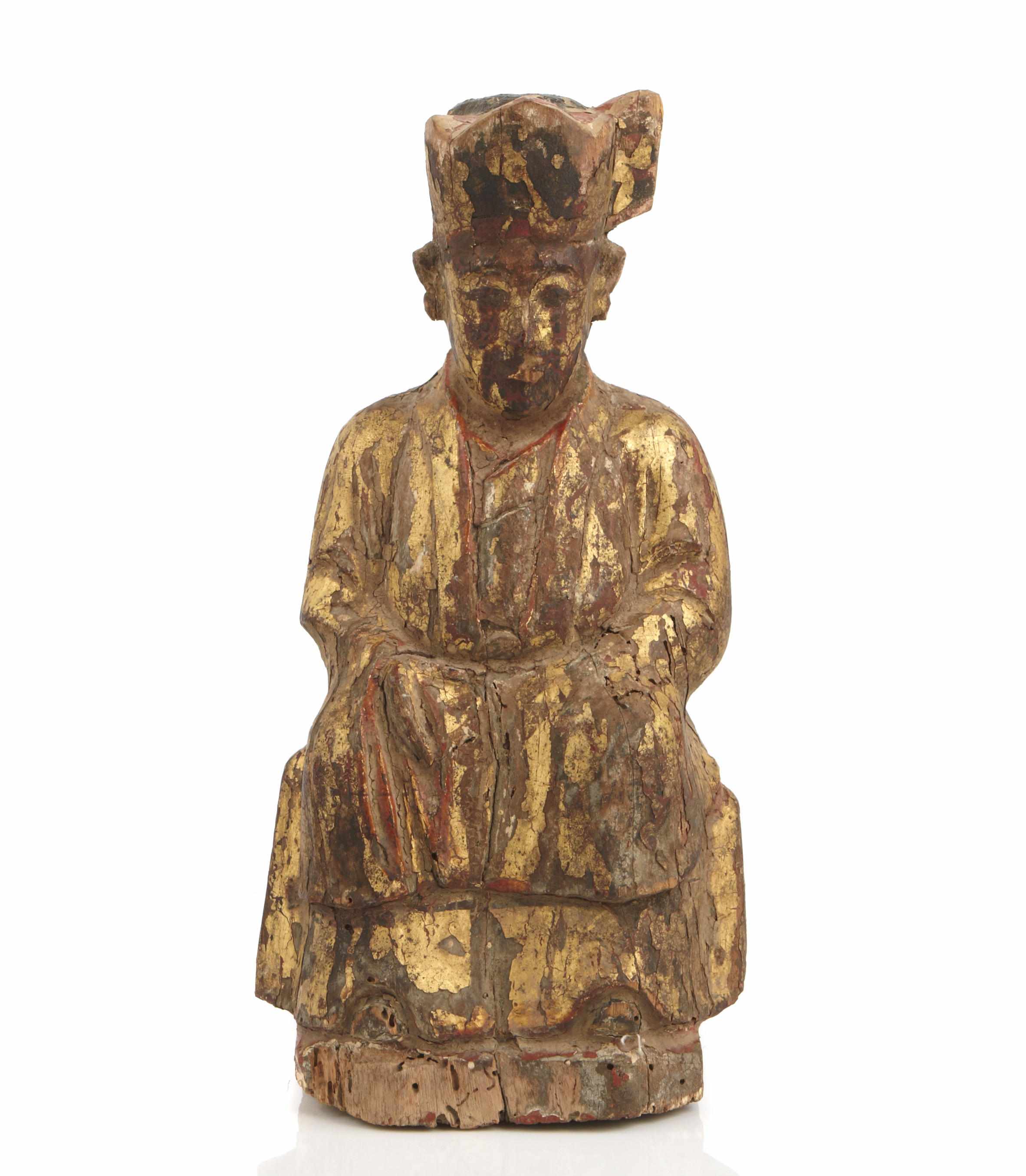 Appraisal: A carved paint decorated and parcel gilt figure of a