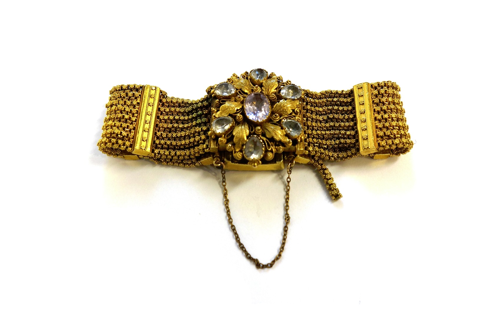 Appraisal: A gold and foil backed gem set bracelet the associated