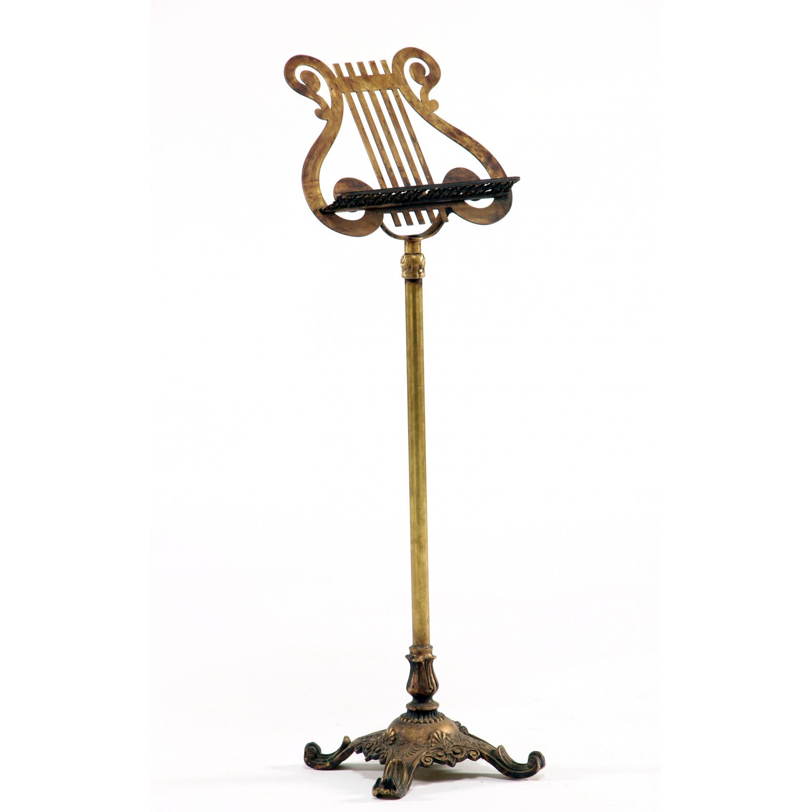 Appraisal: Gilt Brass Adjustable Music Stand early th century classic lyre-form