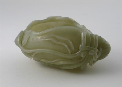 Appraisal: A Chinese pale celadon jade brushwasher formed as a lotus