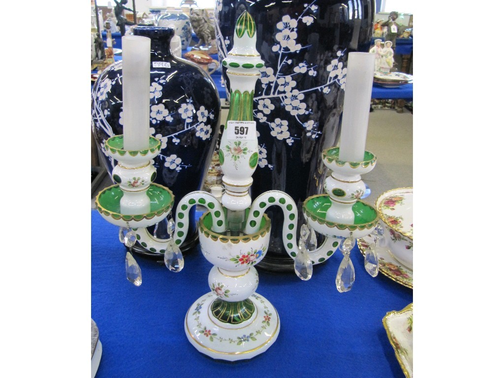 Appraisal: Bohemian green and white glass candelabra with floral decoration and