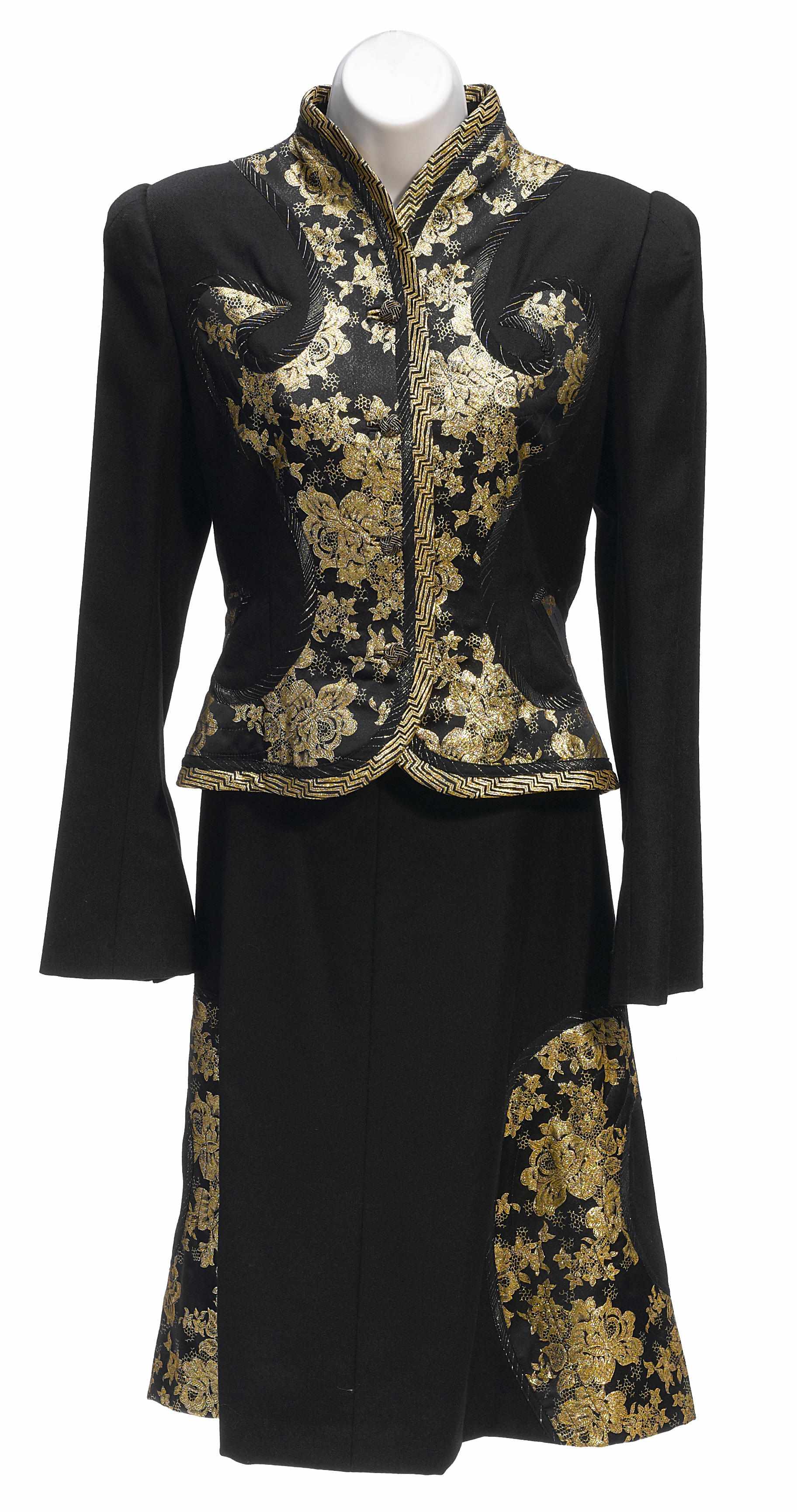 Appraisal: A Koos black with gold trimmed jacket and skirt together