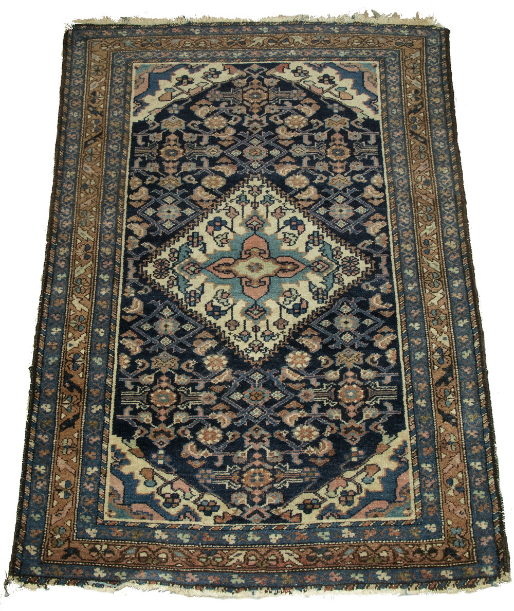 Appraisal: HAMADAN RUG ' X ' Hamadan rug Northwest Persia Tan-ivory