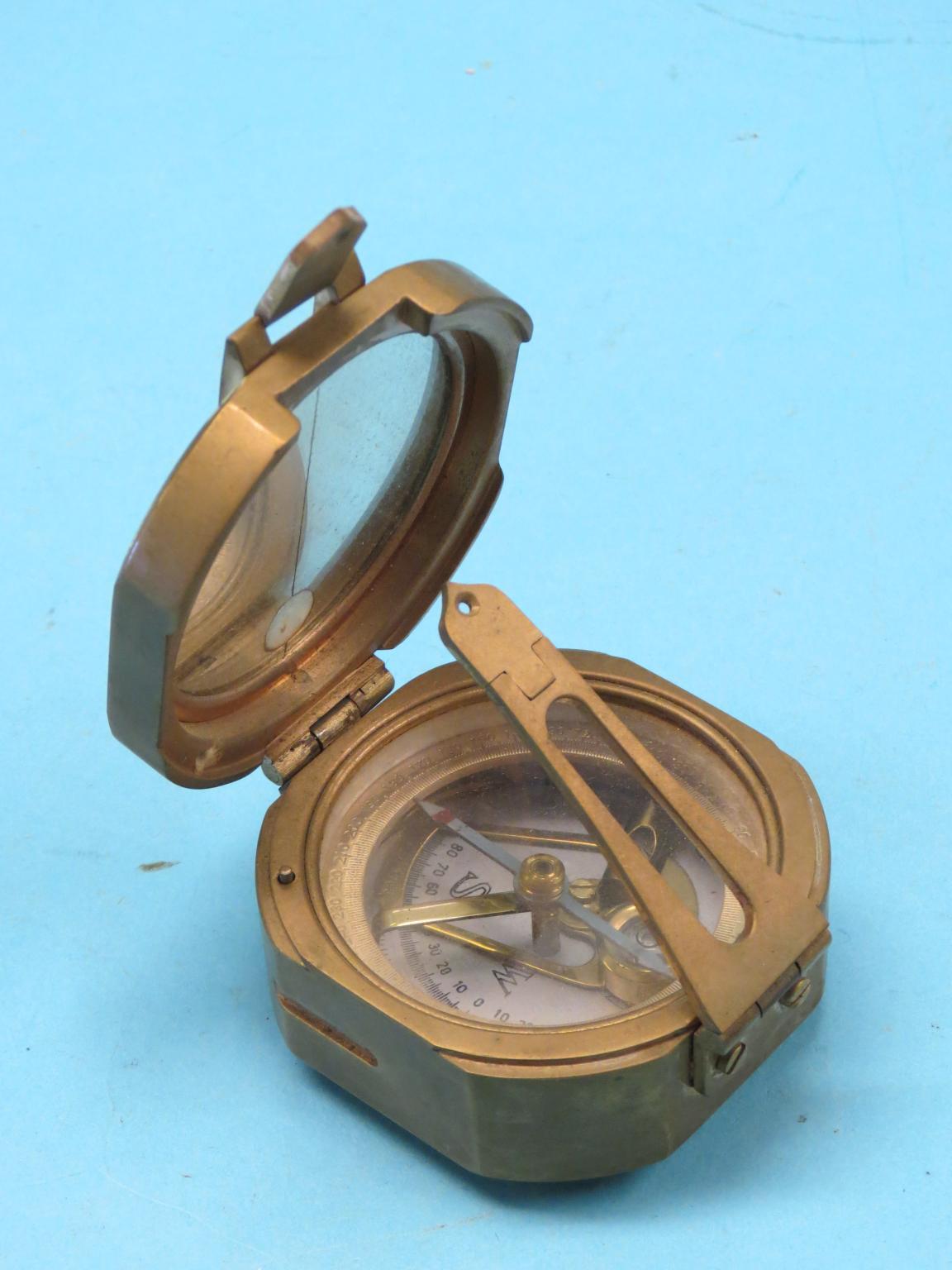 Appraisal: A nautical compass in cast brass case maker Watts Sons