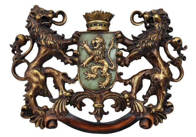 Appraisal: Decorative parcel gilt and painted cast composition armorial crest late