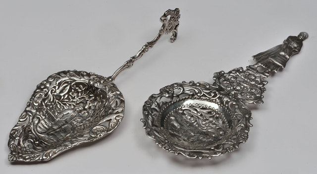 Appraisal: A CONTINENTAL SILVER SIFTER SPOON pear shaped bowl with pierced