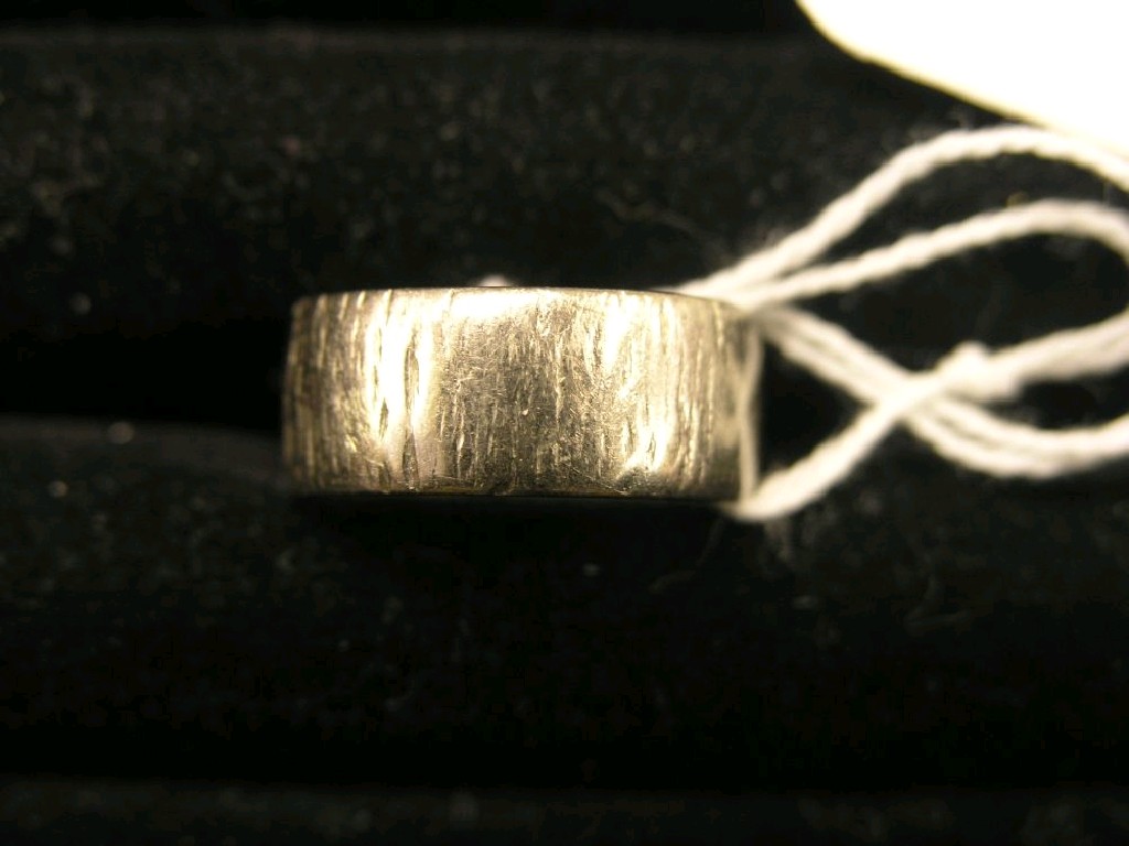 Appraisal: An ct white gold band wedding ring bark effect grams