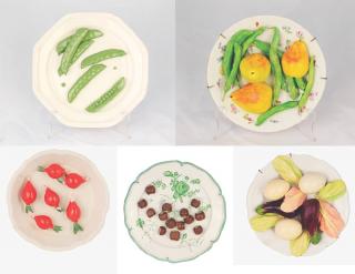 Appraisal: Group of Trompe l oeil ceramic plates Comprising peas hazelnuts