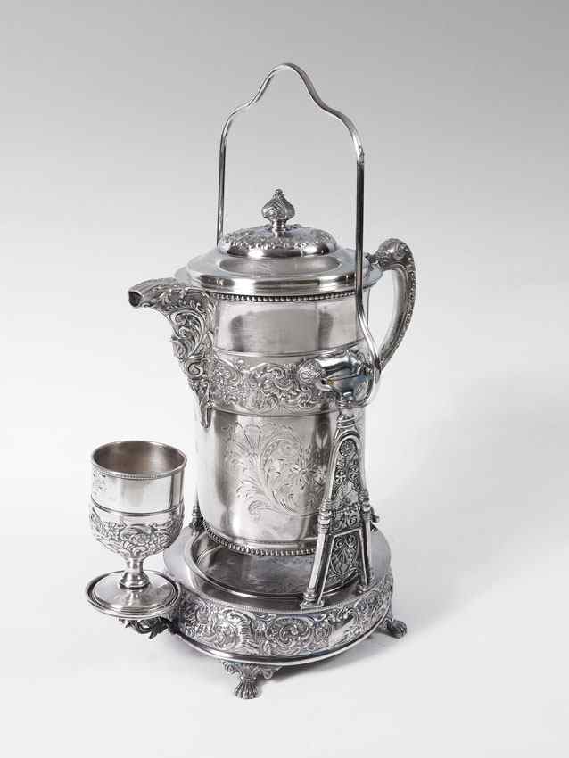 Appraisal: MIDDLETOWN VICTORIAN SILVERPLATE WATER PITCHER Ornate engraved and embossed pitcher