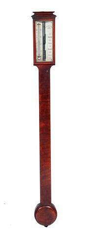 Appraisal: A GEORGE III MAHOGANY STICK BAROMETER with silvered dials by