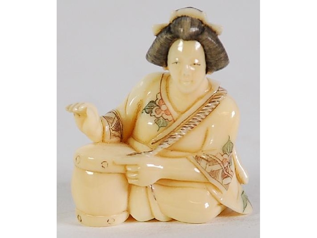 Appraisal: TWENTIETH CENTURY JAPANESE CARVED AND INCISED IVORY NETSUKE of a