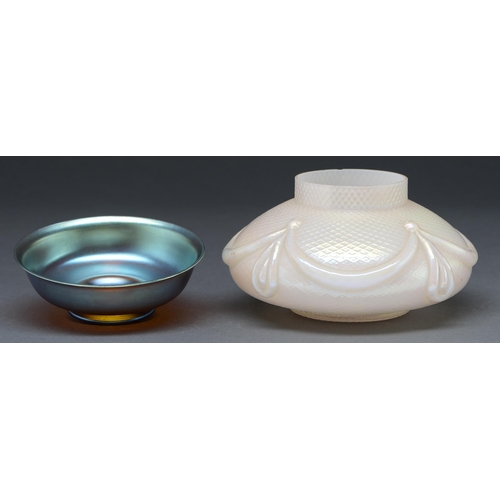 Appraisal: An iridescent glass bowl and a cased iridescent glass moulded