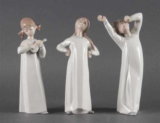 Appraisal: Three Lladro porcelain child figures th century girl holding ukulele