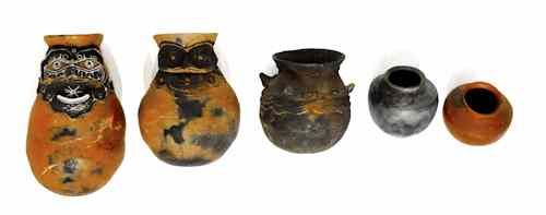 Appraisal: Five New Guinea earthenware figural pots tallest - h