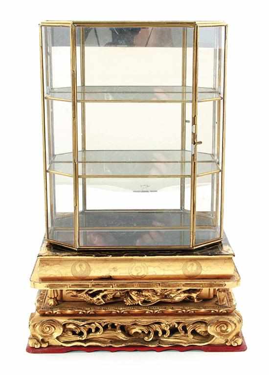 Appraisal: Japanese carved and lacquered giltwood stand with glass display Meiji