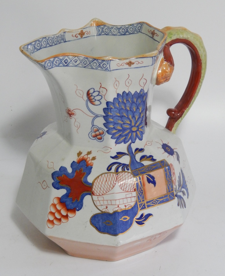 Appraisal: A thC Mason's Ironstone jug the shaped body polychrome decorated