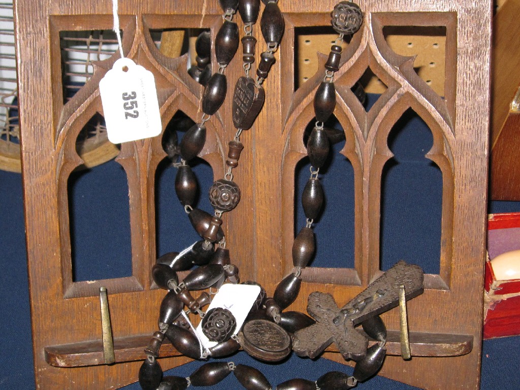 Appraisal: Lot comprising portable lectern and rosary beads