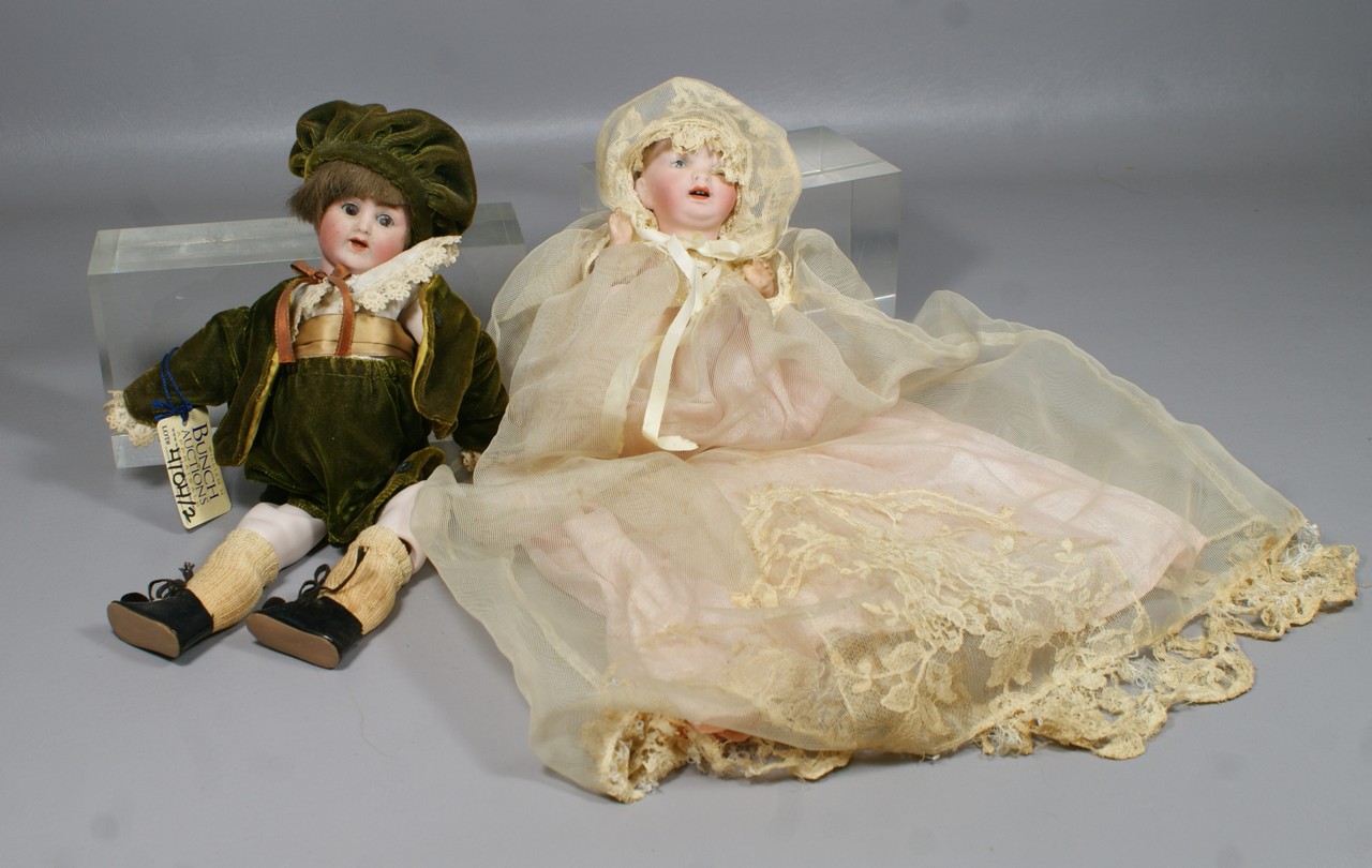 Appraisal: Small Bisque Head Baby Dolls one with painted eyes and