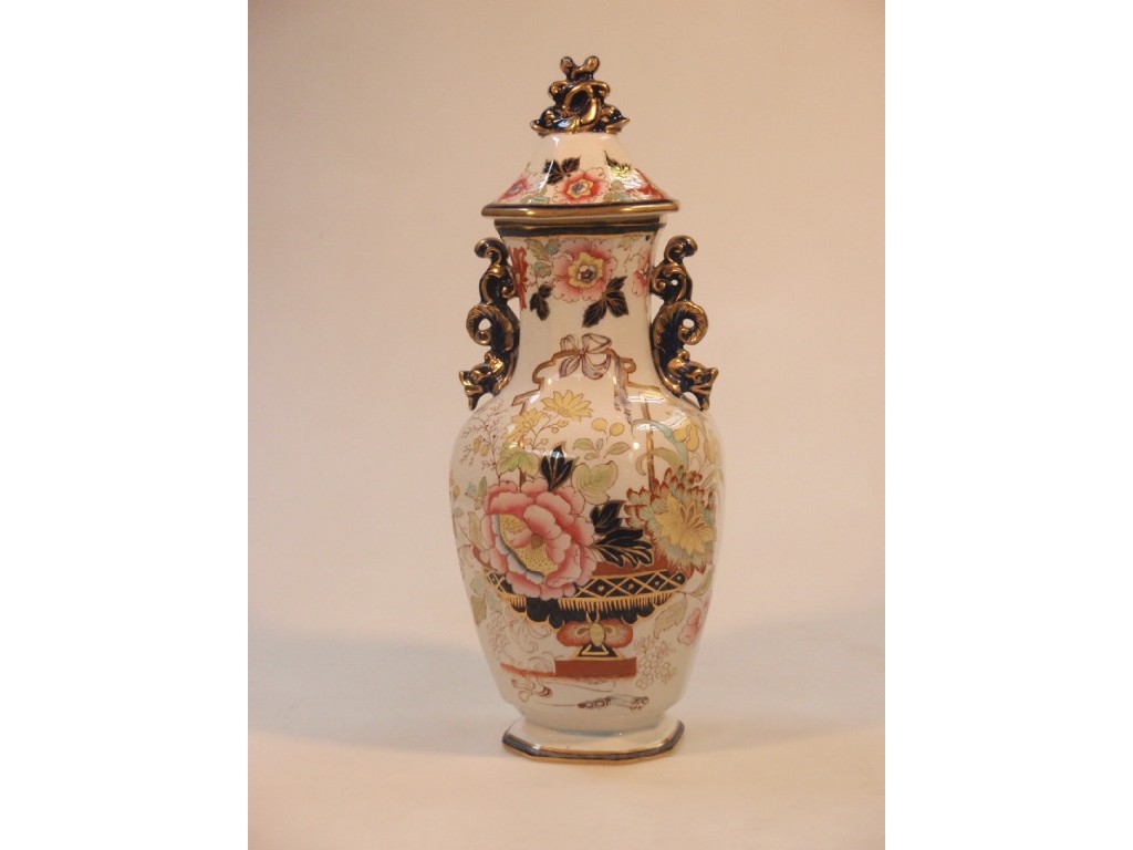 Appraisal: A Victorian Masons ironstone china octagonal baluster vase with cover