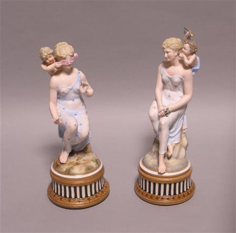 Appraisal: PAIR OF GERMAN PAINTED BISCUIT GROUPS Blue marks for Unger