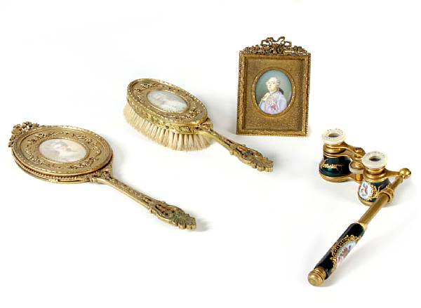 Appraisal: A gilt metal vanity set comprising a brush and a