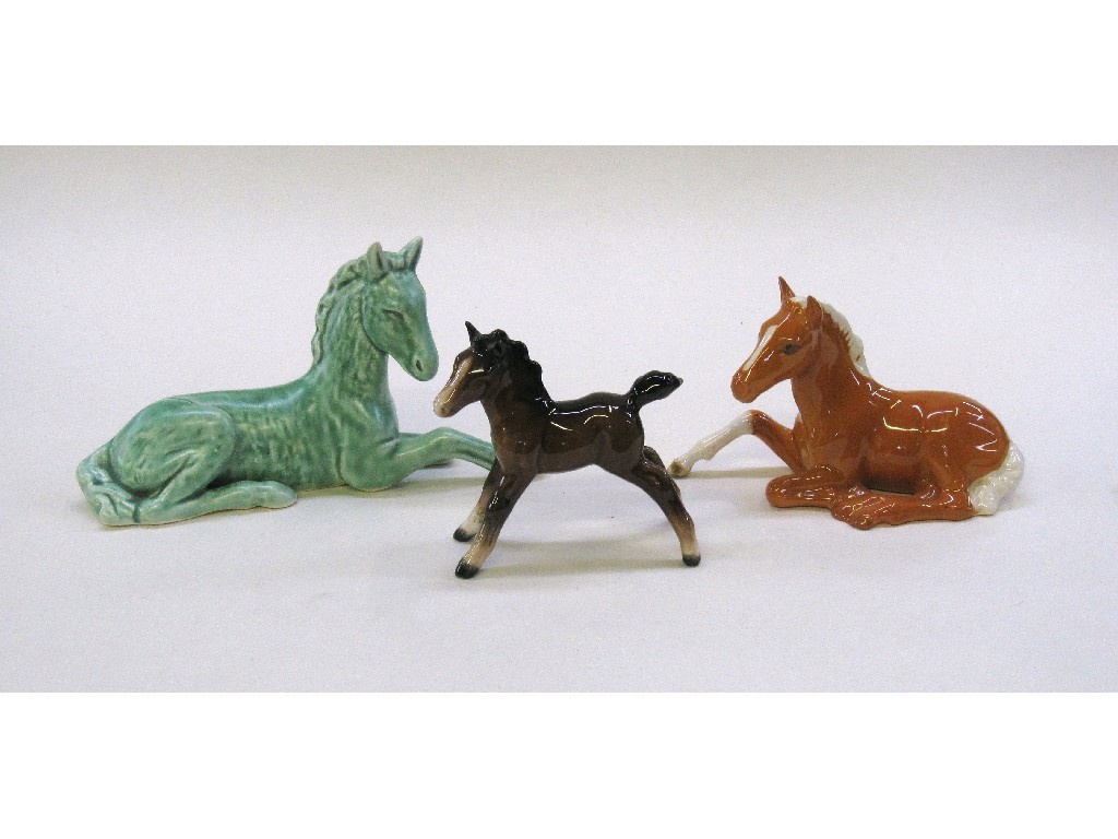 Appraisal: Two Beswick figures of foals and a Sylvac example