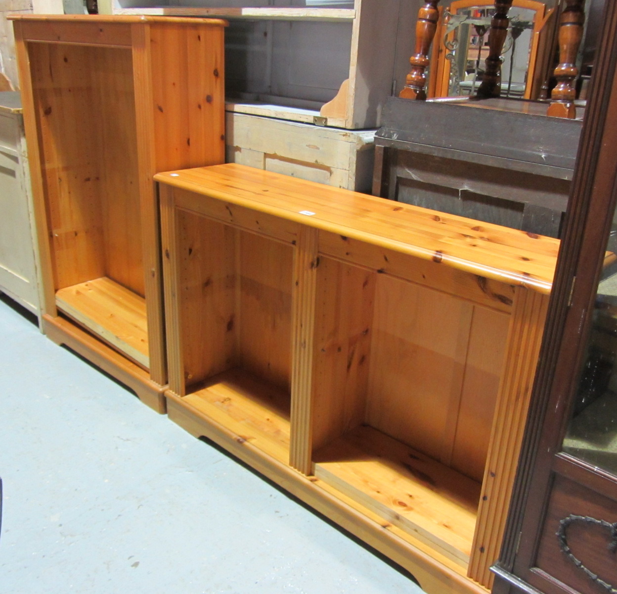 Appraisal: A th century pine bookcase together with another taller