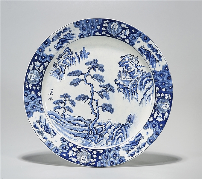 Appraisal: Chinese blue and white porcelain charger with rockery trees design